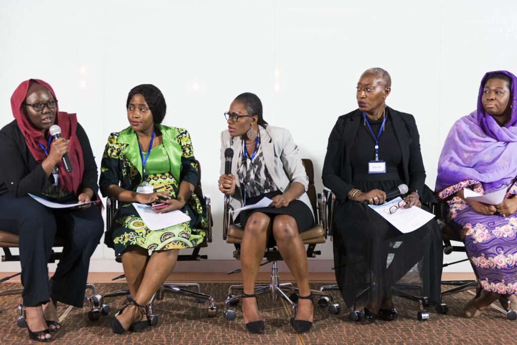 Group business women participating panel
